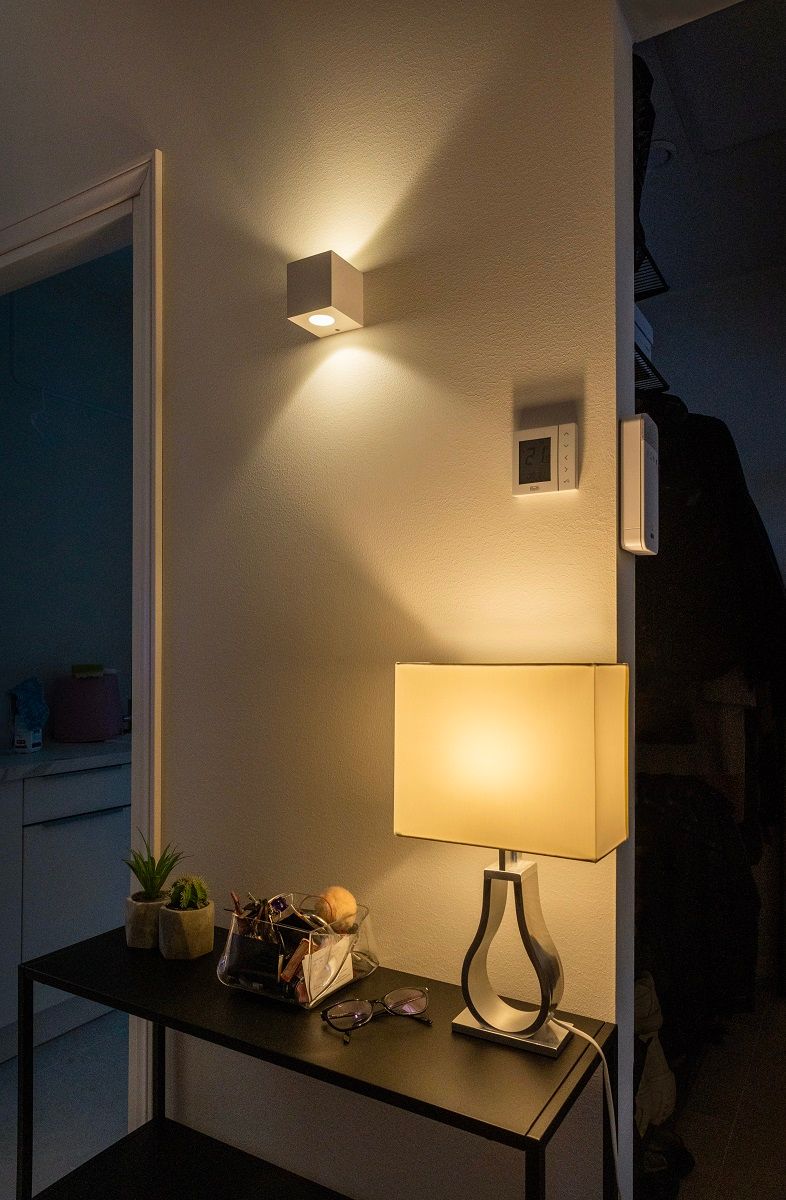 Cubic 2 wall light and IKEA table lamp.